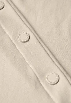 T-Shirt mit Knopfdetail light beige